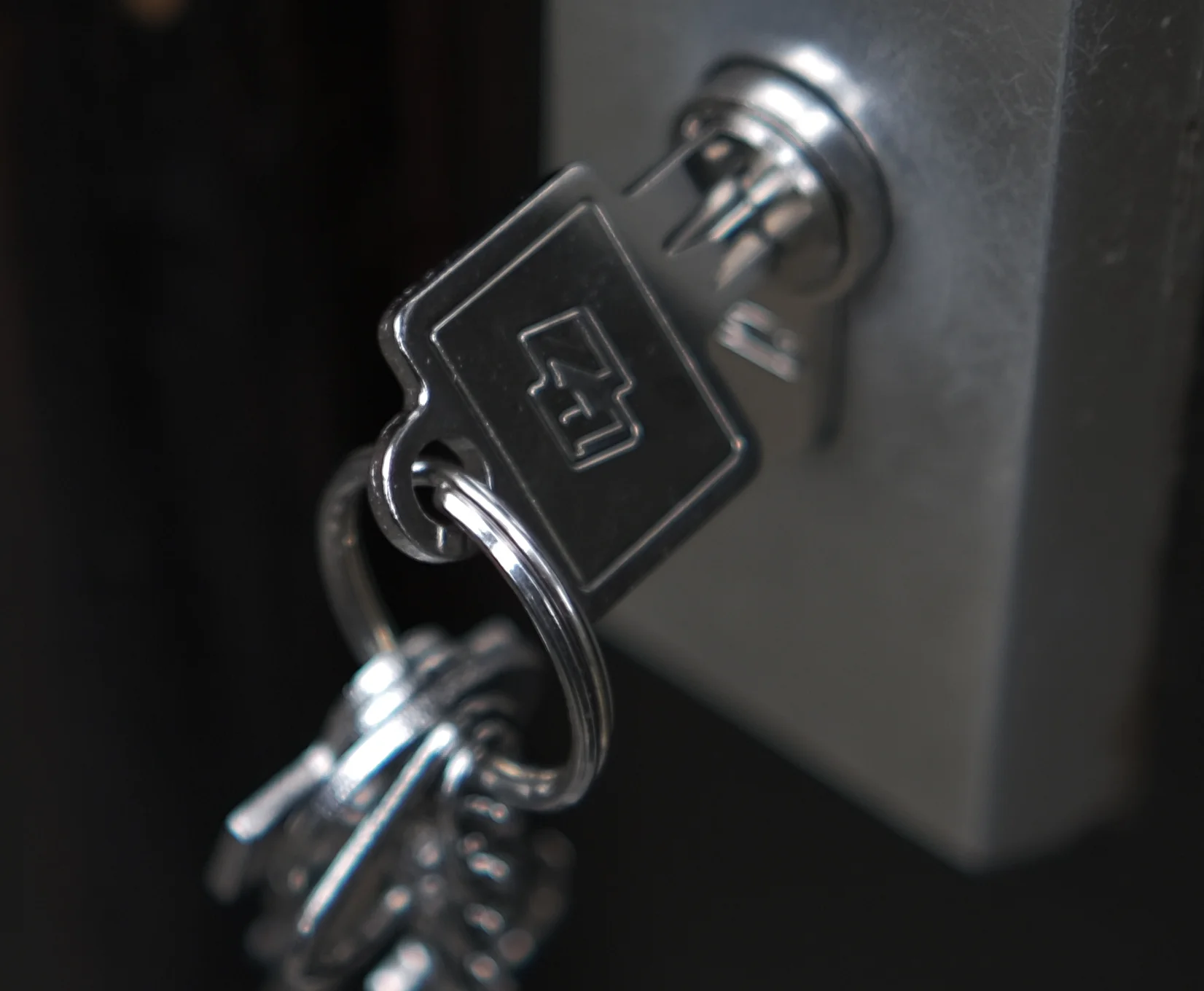 Set of keys inserted in a door lock
