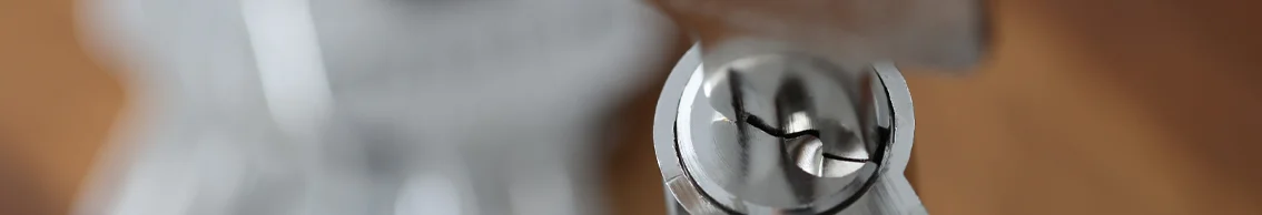 Close-up of a damaged door lock cylinder